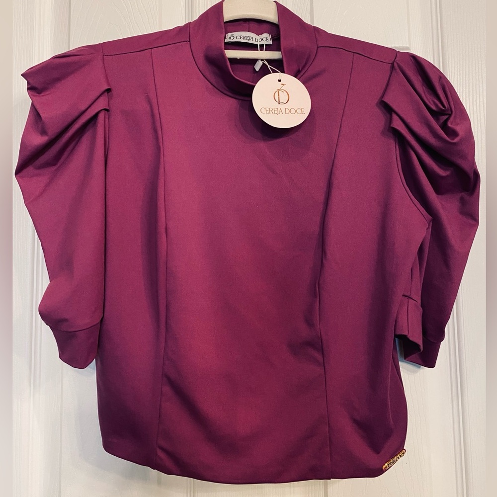 crop top w/ puff ruched sleeves 
Made in Brazil Sz Sm/Med.  plum color